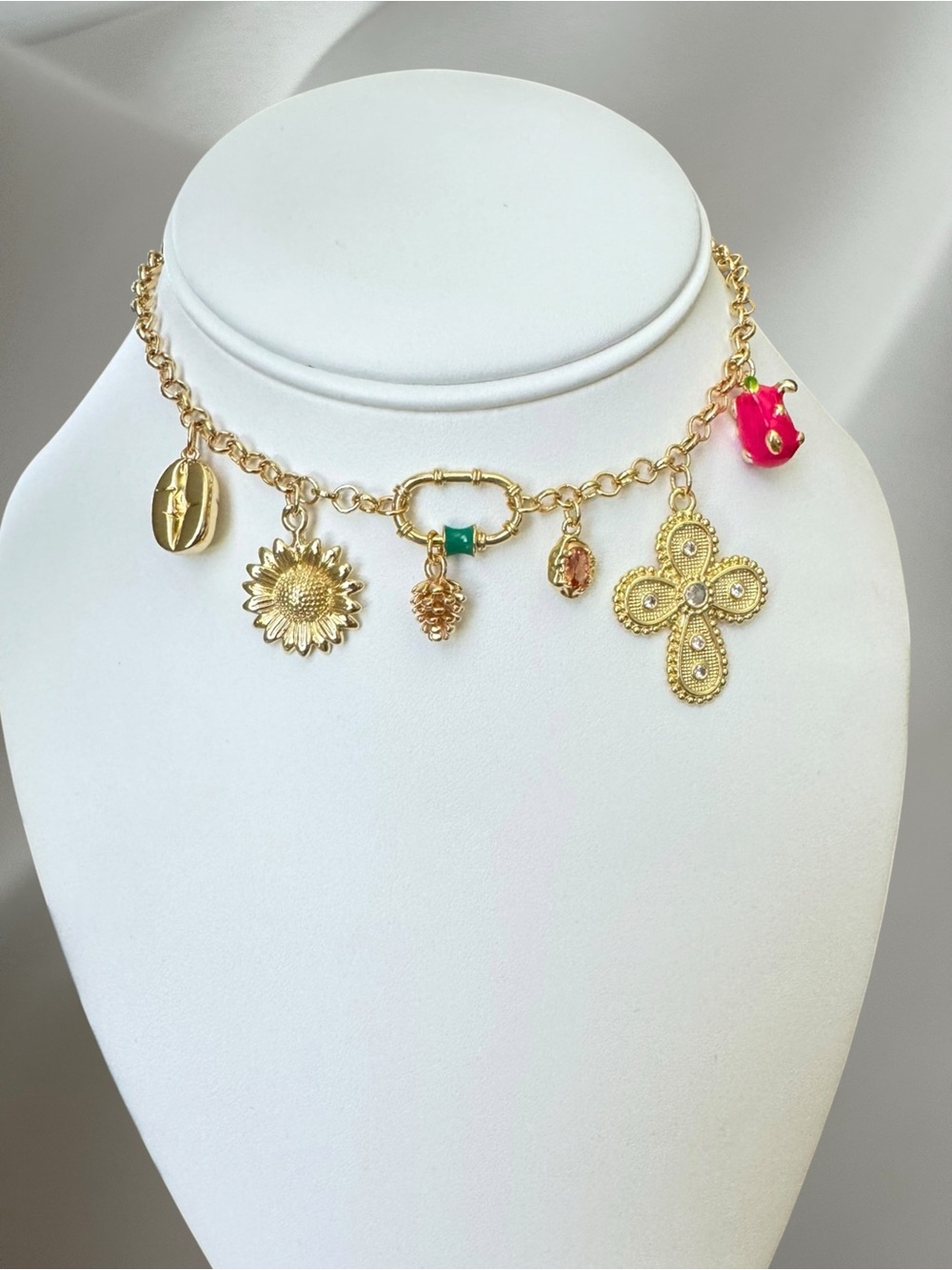 Gold Charm Necklace with Pink Accent and Green Detail